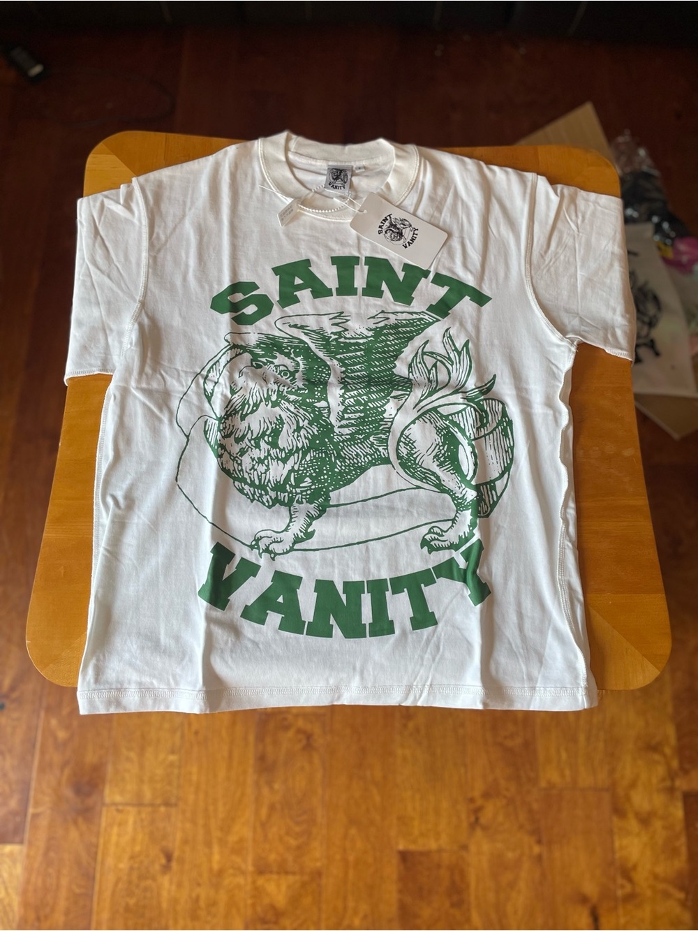 Vanity White Tee with Green Graphic Logo